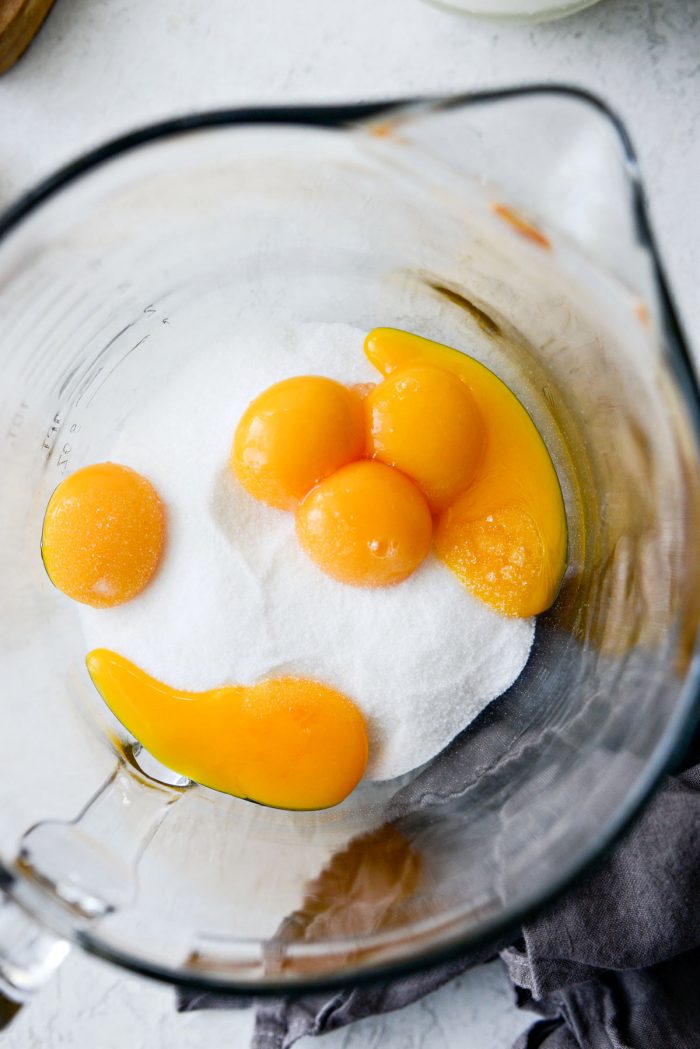 egg yolks and sugar in a large mixing bowl.