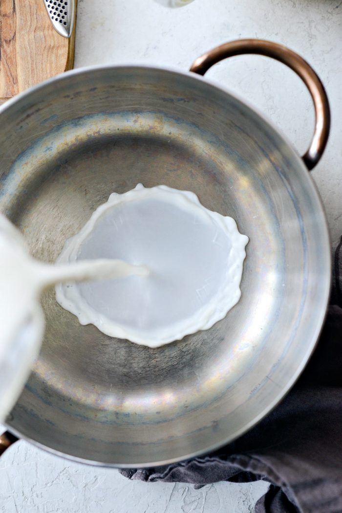 pour 2 cups whole milk into a saucepan.