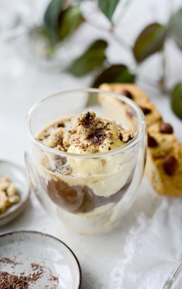 garnish affogato with crushed biscotti and chocolate shavings.