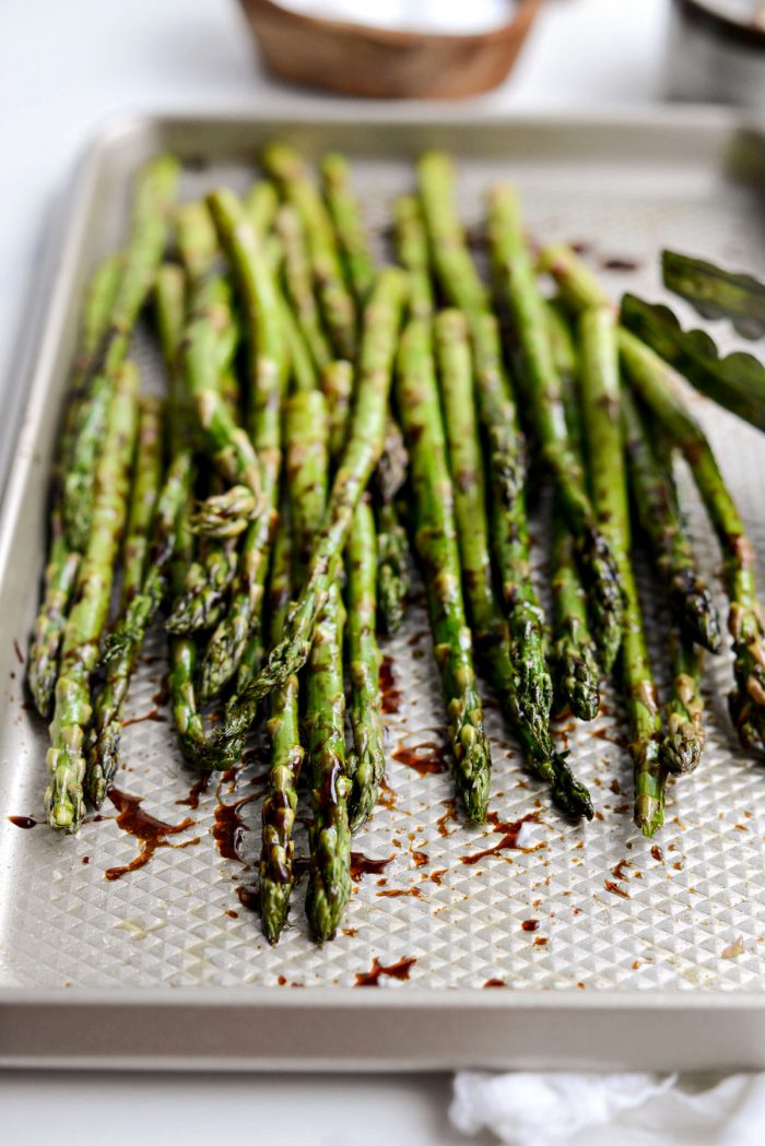 asparagus tossed and coated in balsamic and spices.