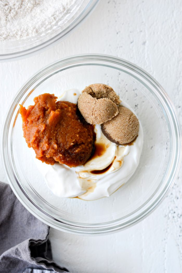 greek yogurt, pumpkin puree,brown sugar and vanilla in a bowl.
