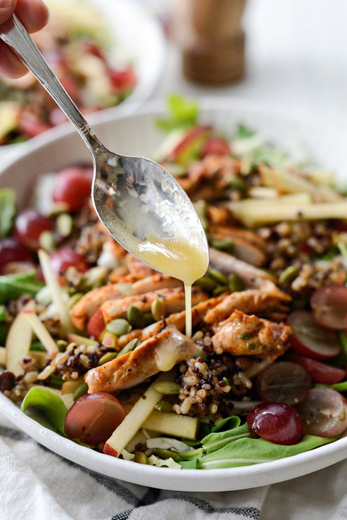 apple cider vinaigrette drizzled over salad.