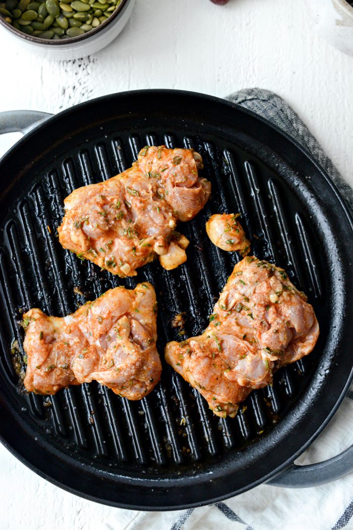 marinated chicken thighs on grill pan
