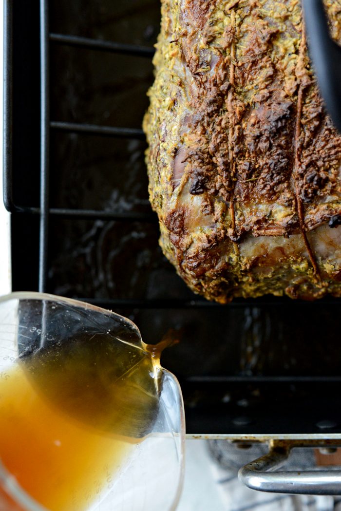 pour beef broth into pan.