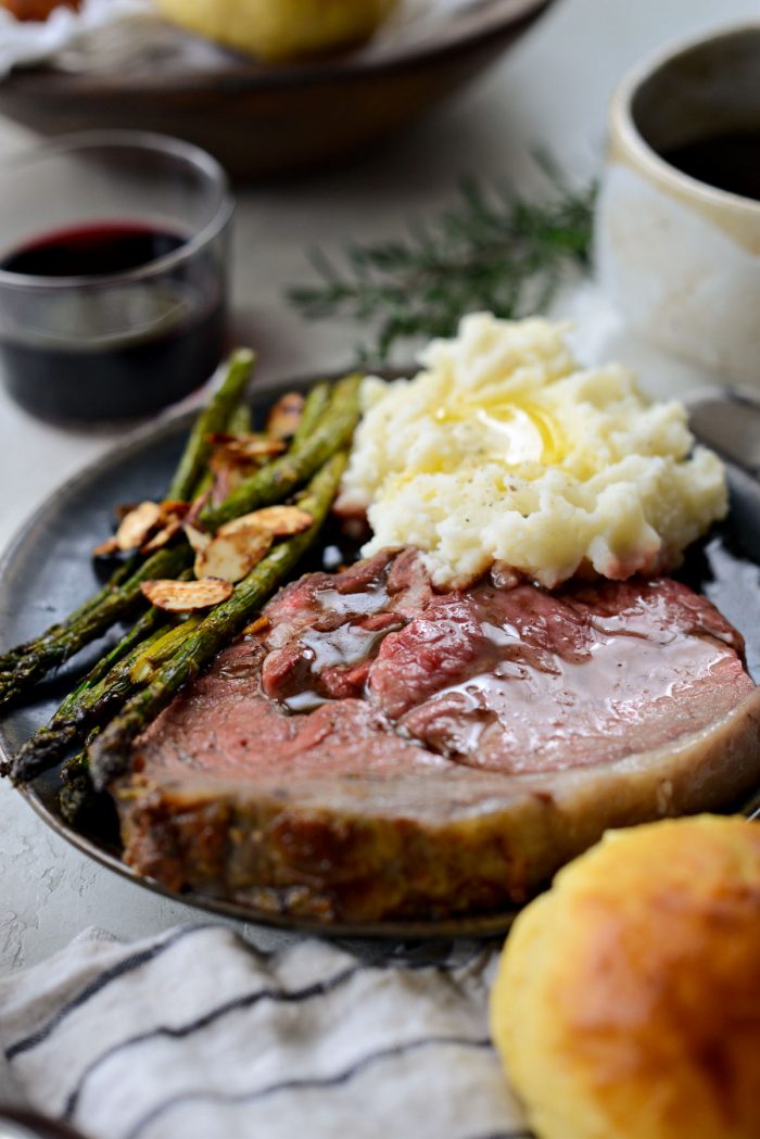 Dijon Rosemary Prime Rib Roast with mashed potatoes and asparagus.