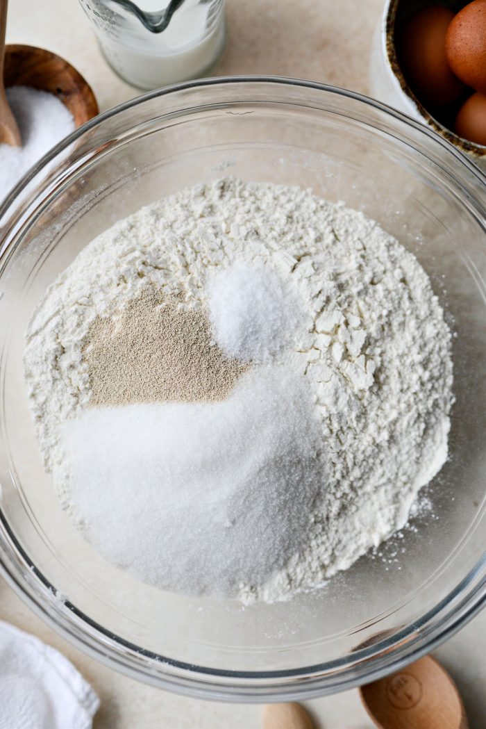 flour, sugar, yeast and salt in a glass bowl.