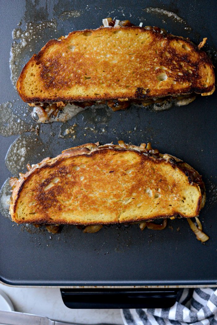 golden brown grilled cheese on griddle.