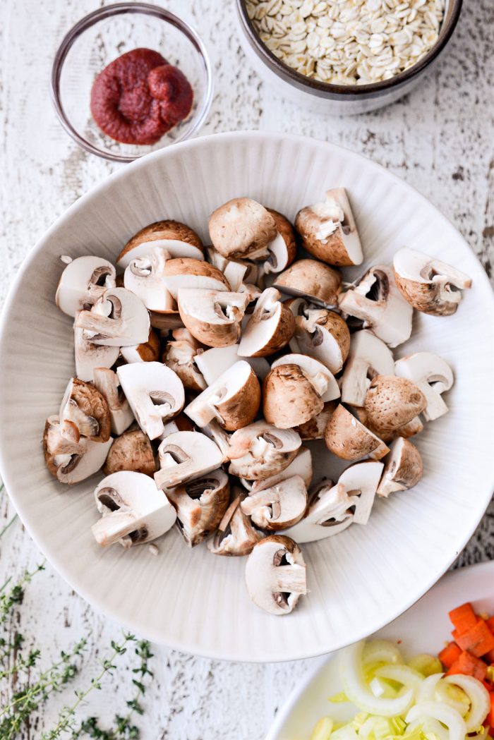 quartered mushrooms in a bowl.