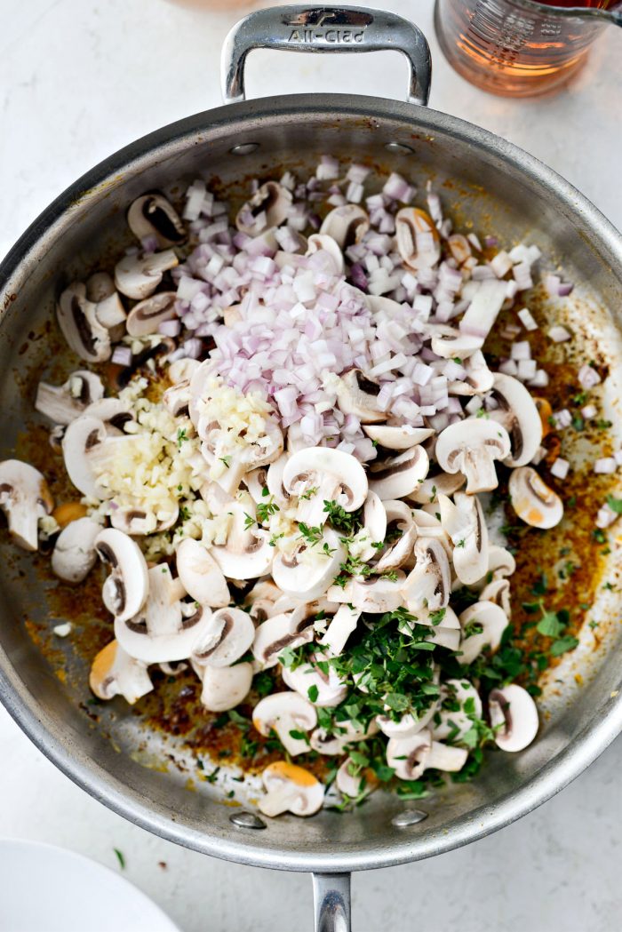 add mushrooms, shallot, garlic and herbs to skillet.