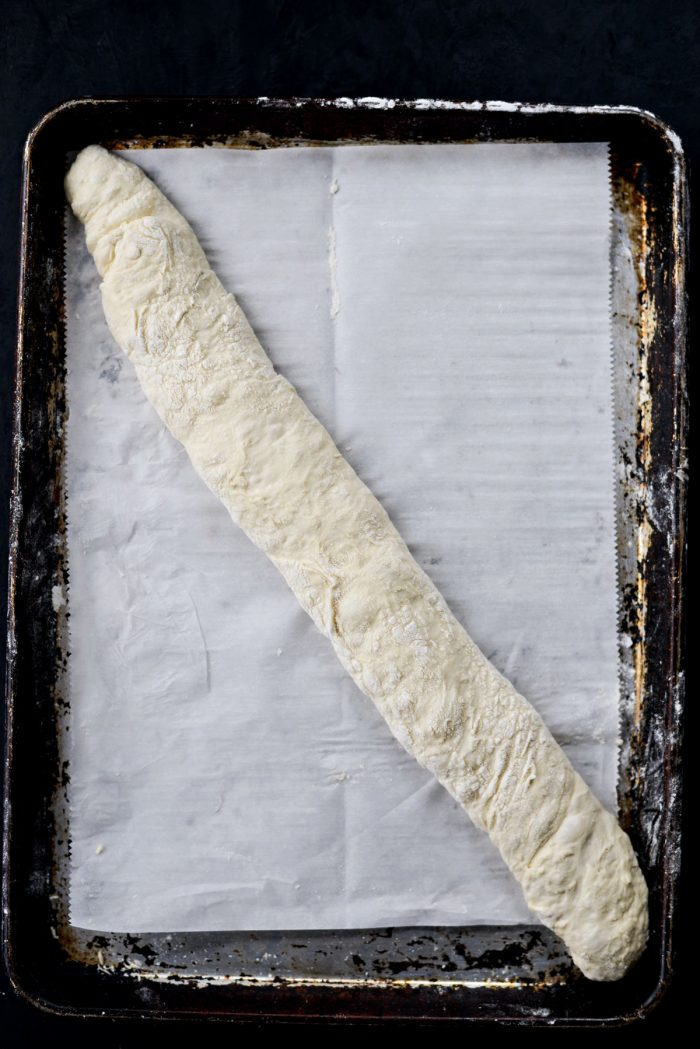 turn over onto parchment and transfer to a baking pan.