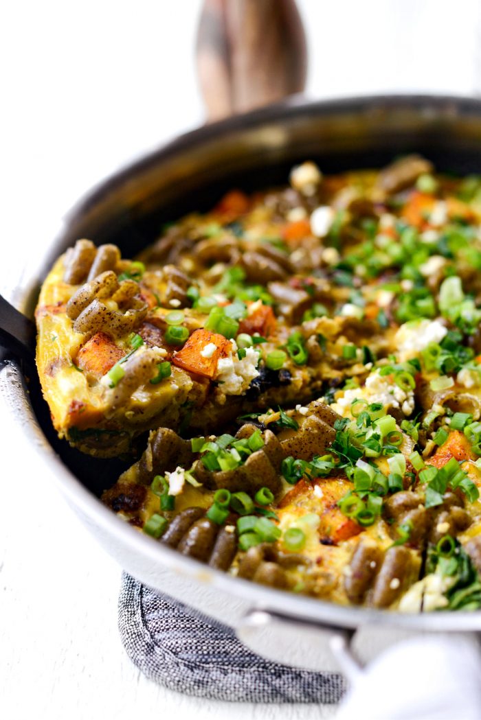 serving Roasted Pumpkin Kale and Feta Frittata from the skillet.