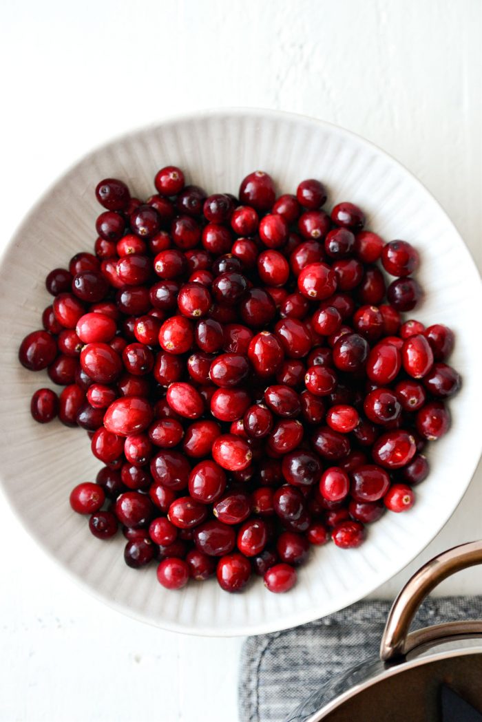 white bowl with cranberries.