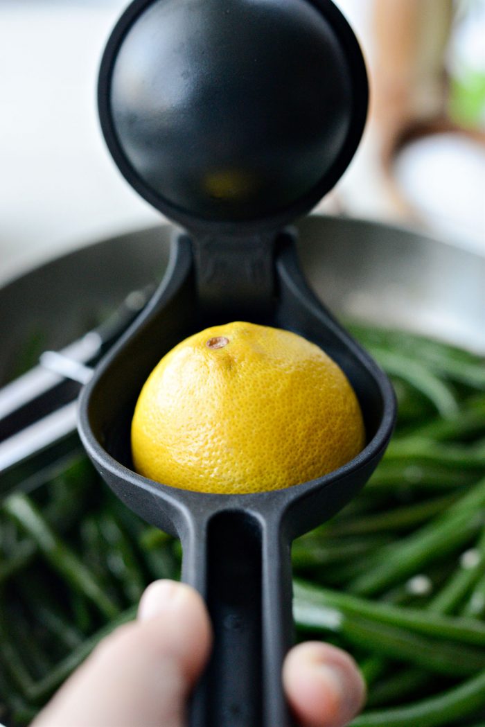 squeezing in fresh lemon juice.