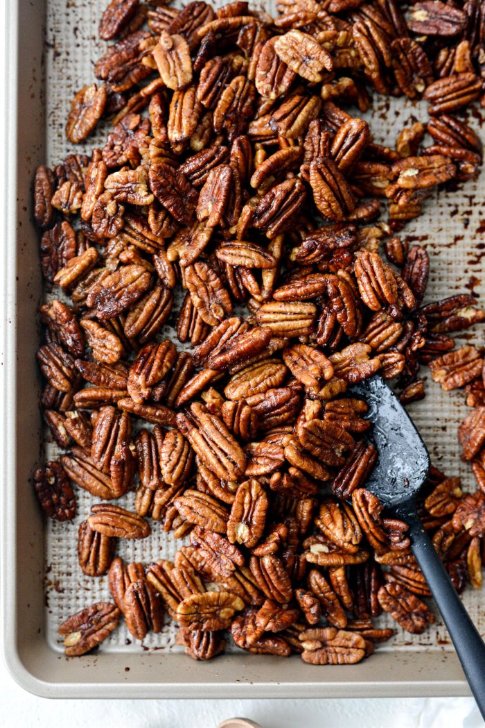 sticky honey vanilla bourbon pecans on sheet pan.