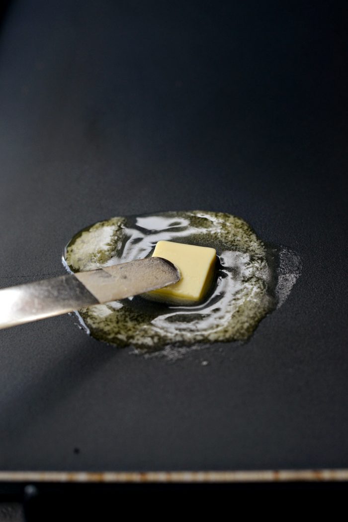 melting butter on a griddle.