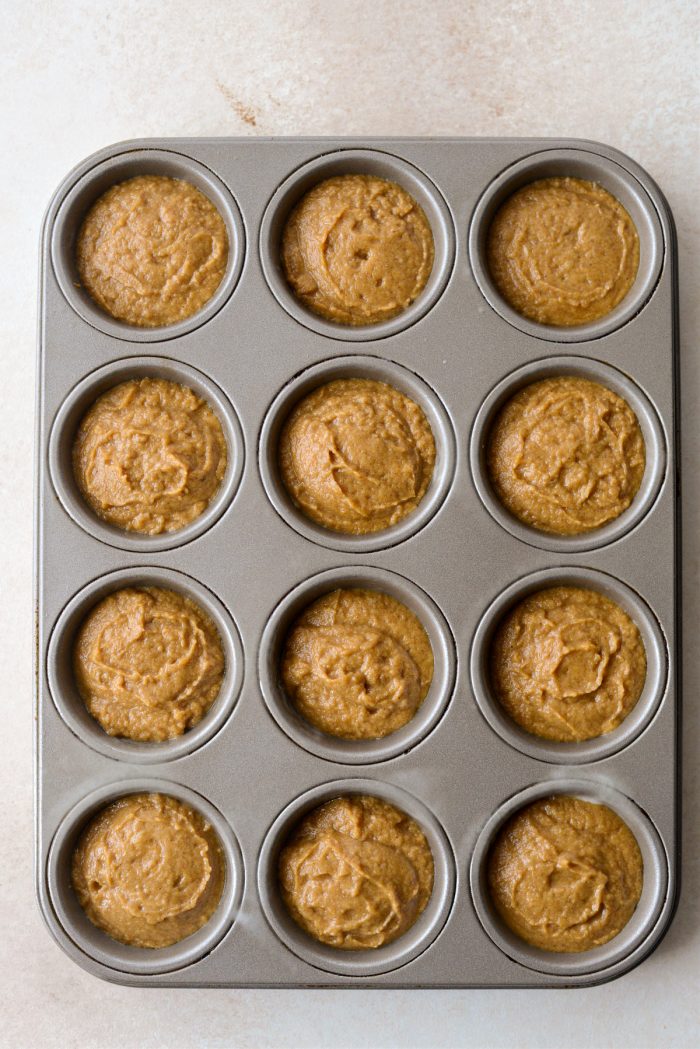 pan tapped on counter to settle batter.