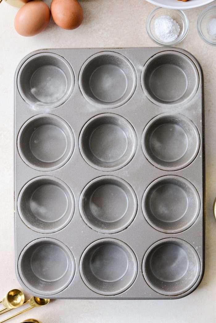 greased muffin tin