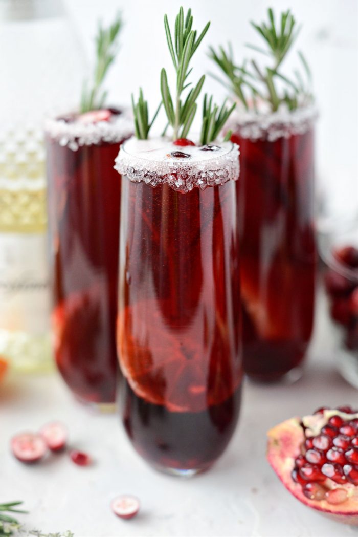 garnish Christmas Morning Mimosas with rosemary sprig.