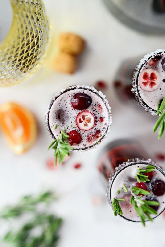 top of Christmas Morning Mimosas with cranberries and pomegranate.