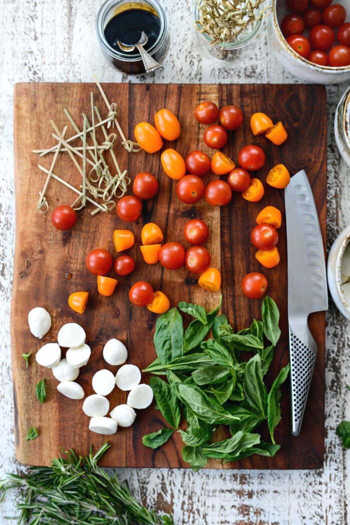 prepping ingredients on wood cutting board.