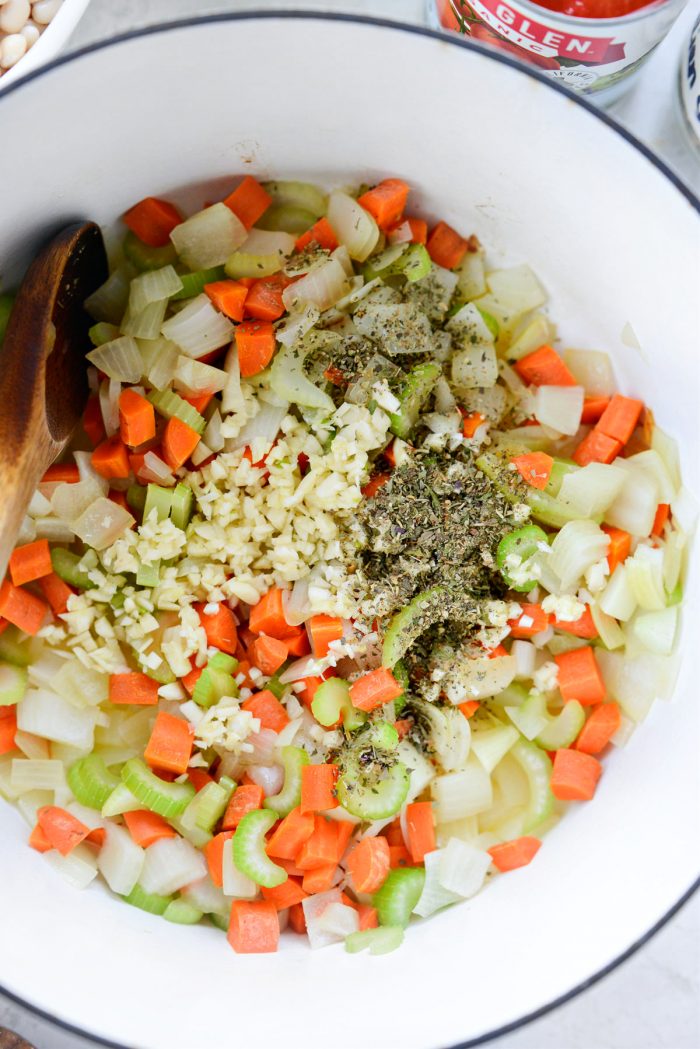 garlic, dried herbs and salt added to vegetables.