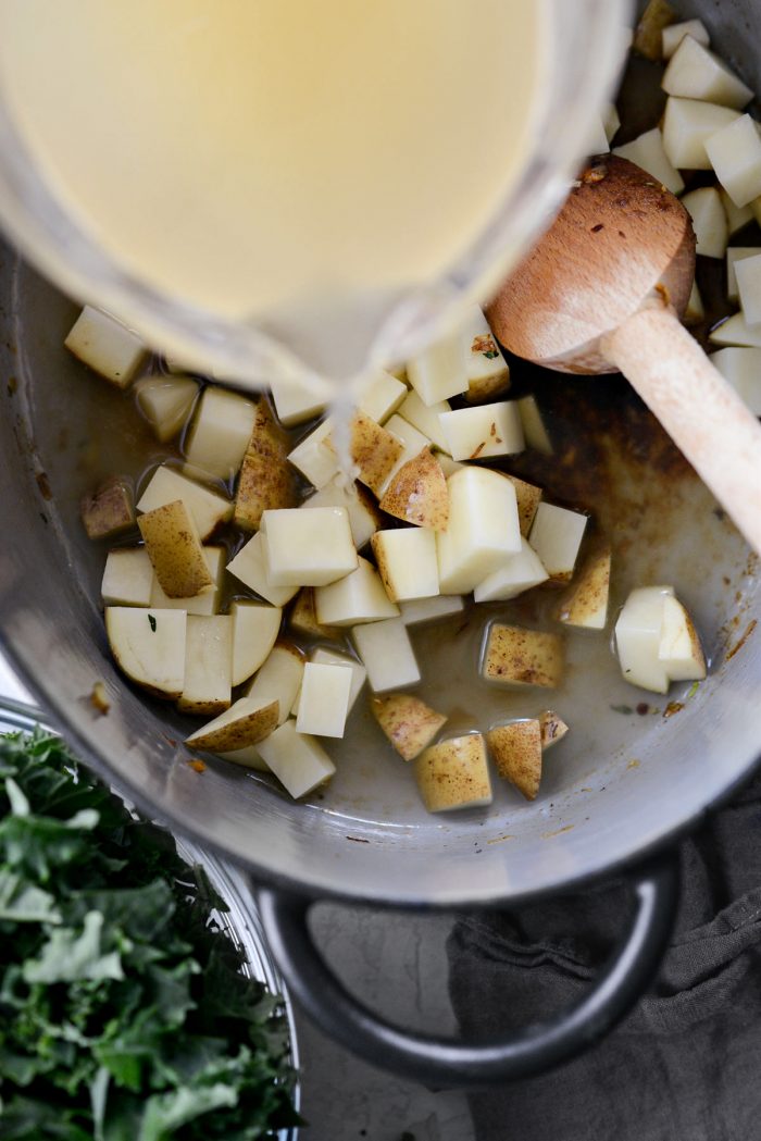 potatoes and broth in dutch oven.