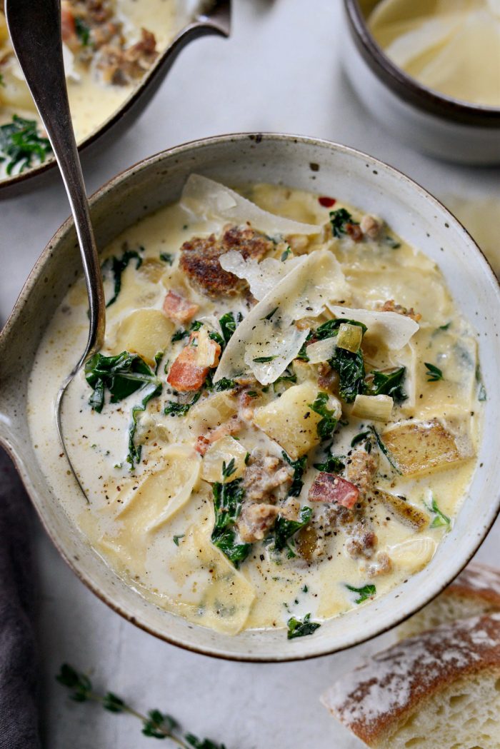 close up of Zuppa Toscana bowl with spoon.
