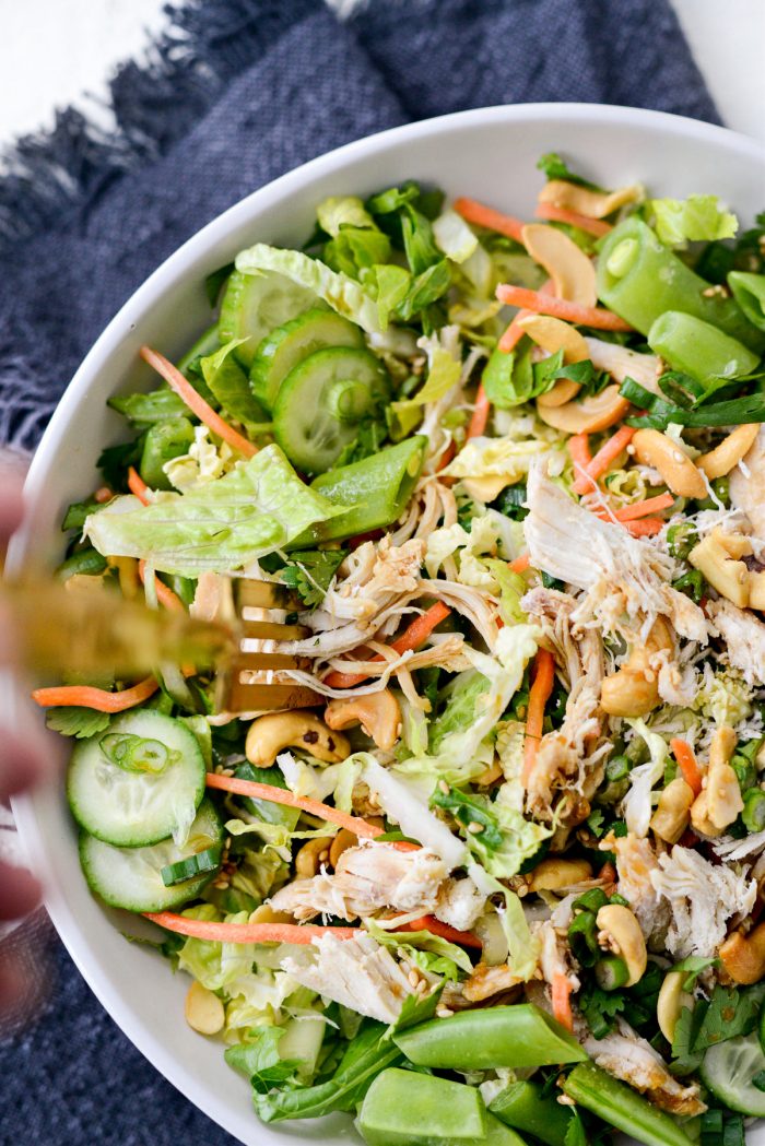 Asian Cashew Chicken Mason Jar Salad in a bowl with gold fork.