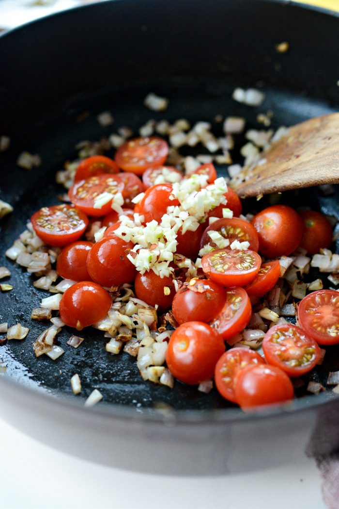 garlic, tomatoes and red pepper flakes added to shallots.