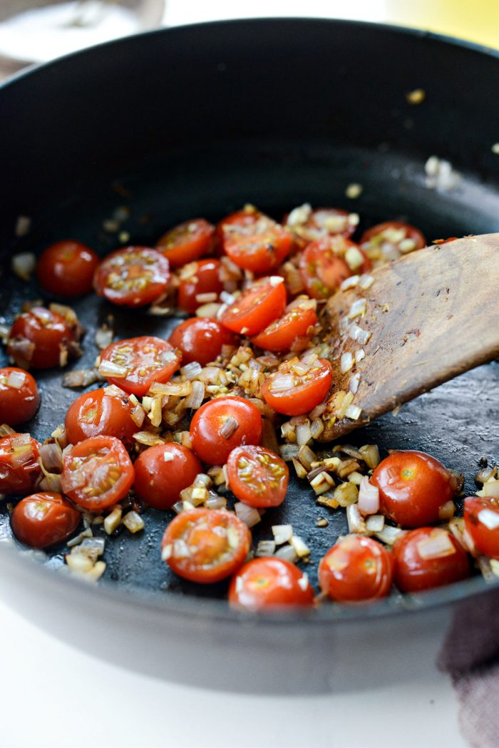 sauteed tomatoes, shallots and garlic in skillet.