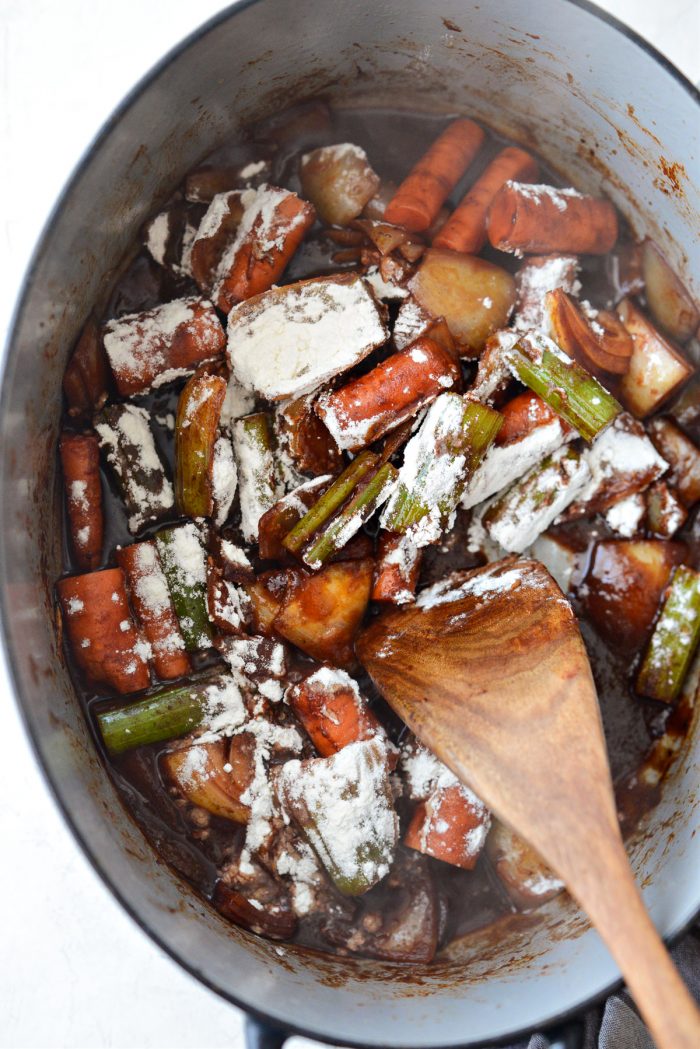 stir flour into vegetables.