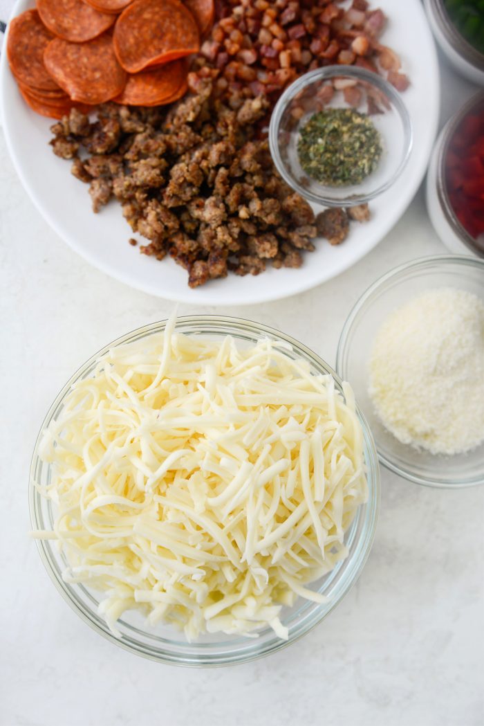 bowls of fontina, mozzarella and parmesan