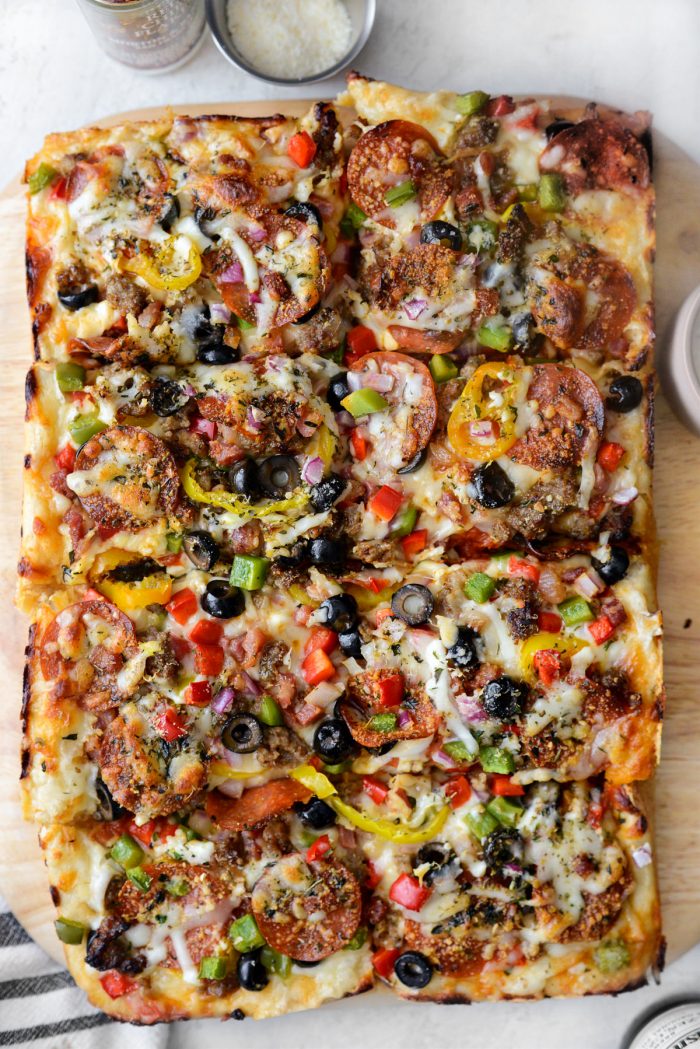 Focaccia Pizza Supreme sliced into eight pieces