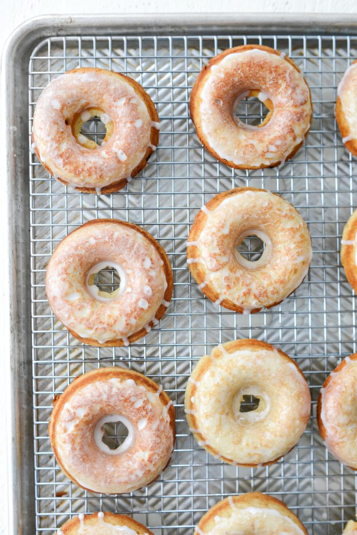 Glazed Buttermilk Cake Doughnuts on wire rack.