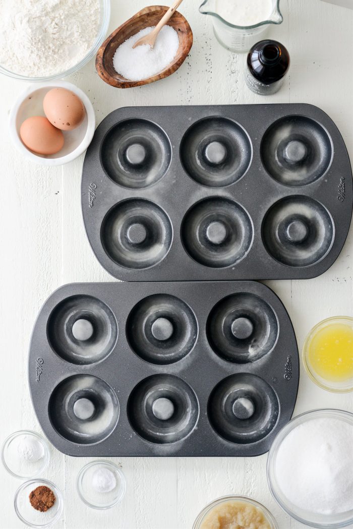 spray doughnut pans with nonstick spray