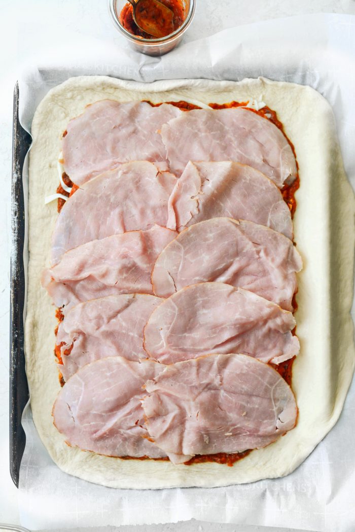 arrange ham over pepperoni