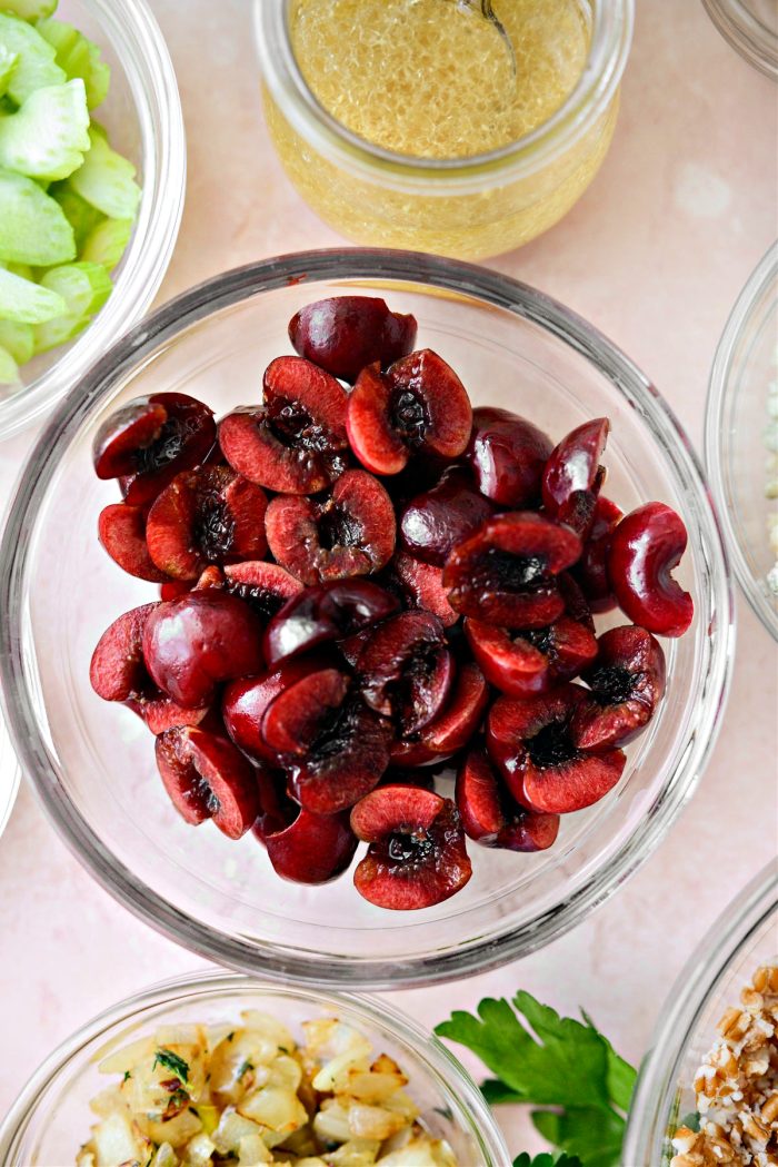 Remove pits from cherry and cut in half