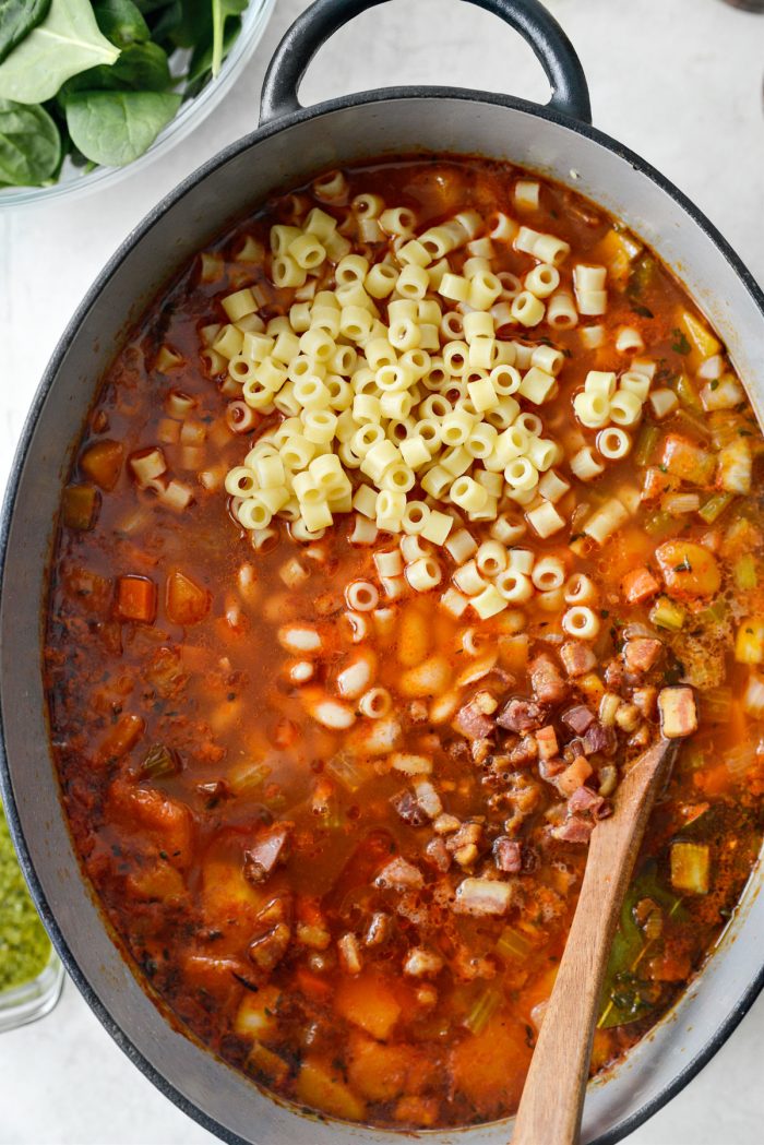 pasta, beans and crispy pancetta added to pot