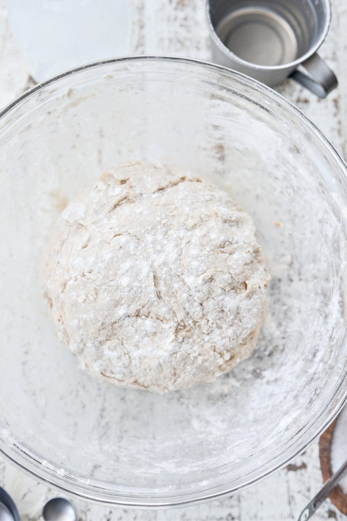 shape into a ball and dust with flour