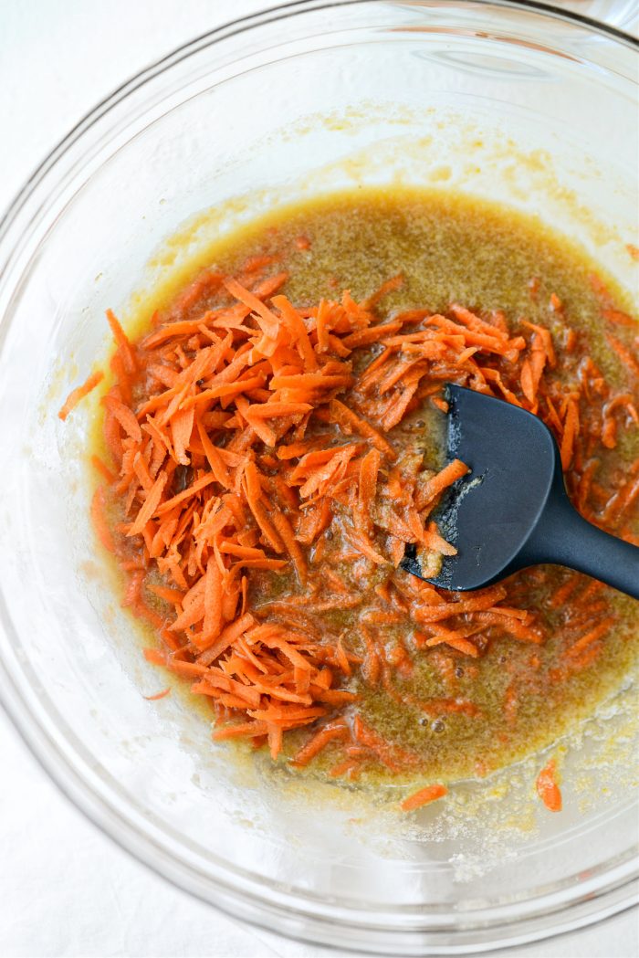 whisked wet ingredients with shredded carrot