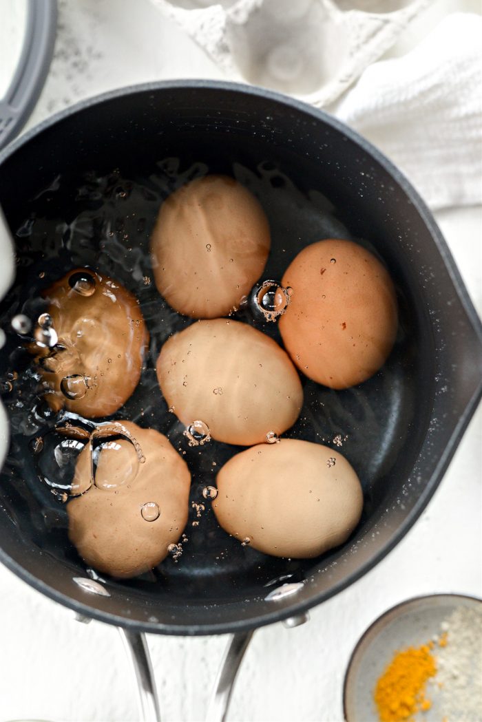 eggs and water in saucepan