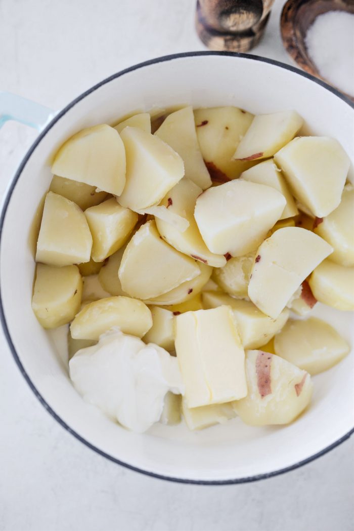 cooked potatoes, milk, sour cream and butter