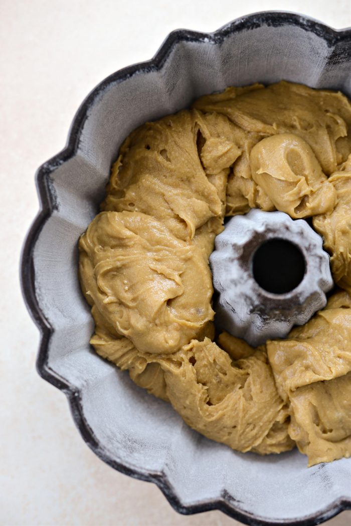 spoon batter into prepared bundt pan