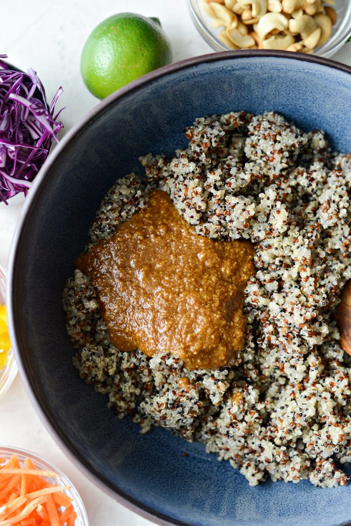 quinoa and dressing in serving bowl