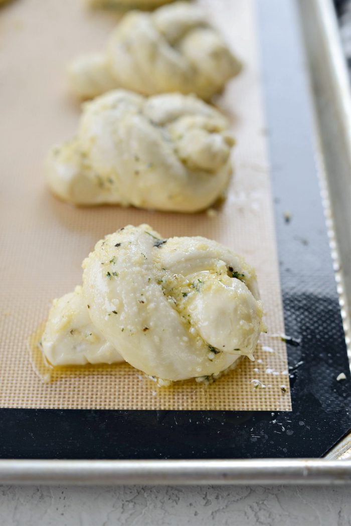 coated knots in garlic parm herb butter