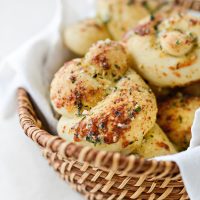 basket of Easy Homemade Garlic Herb Knots