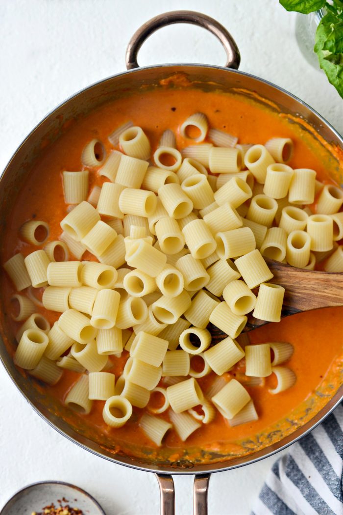 add cooked pasta to sauce