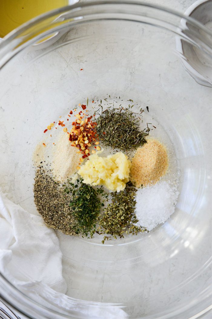 garlic, dried herbs and spices in a bowl