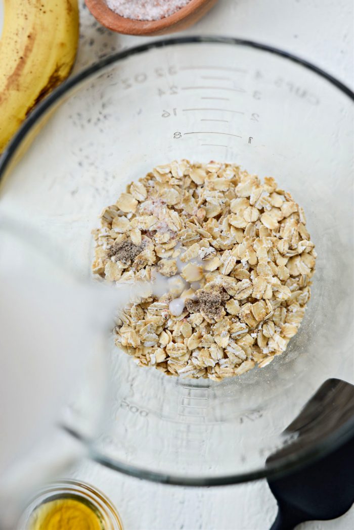 oats, spices and milk in a bowl