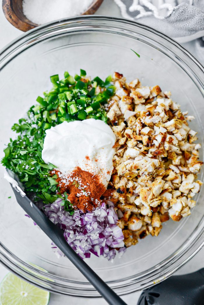 greek yogurt and chili powder in bowl.